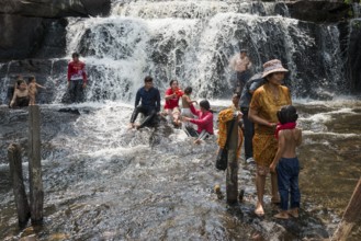 Kulen waterfall with bathing people, Phnom Kulen National Park, Siem Reap, Cambodia, Asia