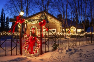 Christmas decorated house, bed and breakfast, dusk, Delta Junction, Alaska, USA, North America