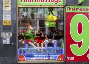 Colourful advertisement on the shop window, Thai Massage, Prague, Czech Republic, Europe