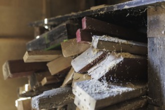 Cut wood lying on a shelf in a wood workshop in Berlin, 14/08/2024