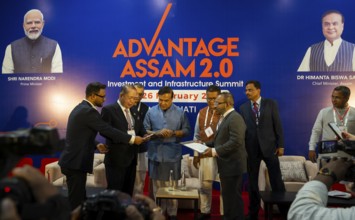Assam Chief Minister Himanta Bishwa Sarma with investors on a MoU sign function during The