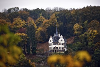 Listed, late historicist villa with stepped gable above the banks of the Rhine in autumn, Remagen,