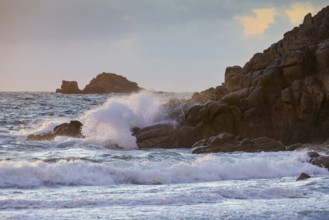 Waves breaking on the rocky coast near Plouarzel on the Atlantic coast, Département Finistère,