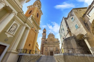 France, French Riviera, Menton Basilica Michael Archangel and old city streets in historic center,