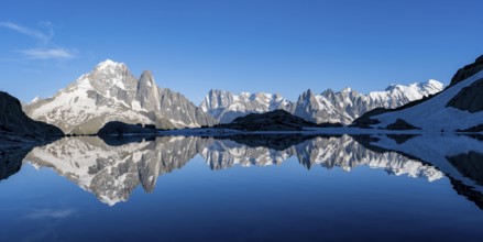 Mountain landscape in the evening light, water reflection in Lac Blanc, mountain peak, Aiguille
