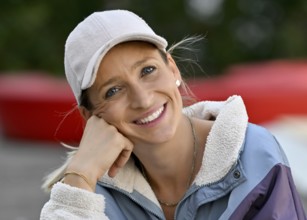 Young woman, blonde, portrait, baseball cap, smiling, Stuttgart, Baden-Württemberg, Germany, Europe