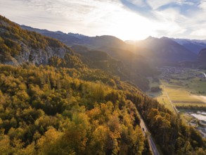 Evening sunset over autumn forest and mountain landscape, Switzerland, Europe