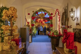 Christmas decorated passage to the mulled wine stand in the side passage at the Christmas market,