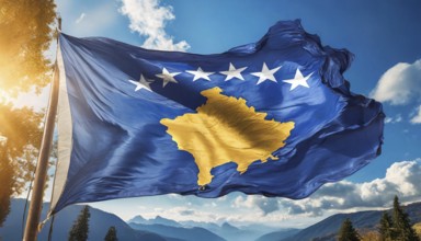 Flags, the national flag of Kosovo flutters in the wind