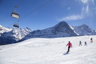 25 March 2024: Skiing against the backdrop of the north face of the Eiger in Grindelwald,