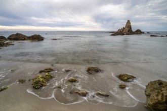 Rocky coast, rocks washed by water, Cabo de Gata-Nijar Natural Park, Almeria, Andalusia, Spain,