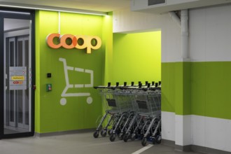 Coop entrance shopping trolley