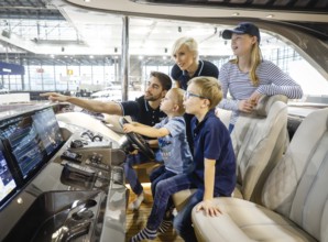 Messe boot Düsseldorf, Model family posing on the English Princess Yacht Rose Y85 on the occasion