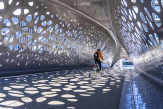 Light effects from the sun in the Parkbruk, a cycle and pedestrian bridge in the city centre of