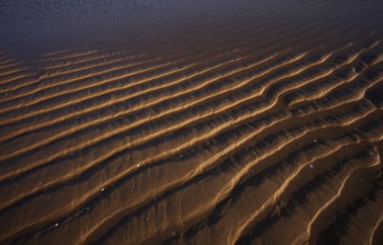 Sand ripples, wavy lines in the sand, structure, sandy beach, Meia Praia beach, Lagos, Atlantic