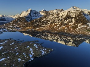 Aerial view of fjord, steep mountains, coast, winter, morning light, reflection, Moskenesoya,