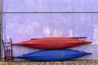 Two paddle boats attached to a wall, Burano, Venice, Veneto, Italy, Europe