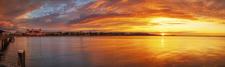Extensive sunset over the calm sea in intense colours, Rügen