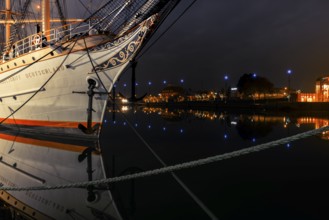 View of the bow of a tethered sailing ship at night, Bremerhaven, Bremen, Germany, Europe