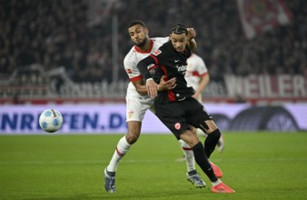 tackle, action, foul, Josha Vagnoman VfB Stuttgart (04) v Hugo Ekitike Eintracht Frankfurt SGE (11)