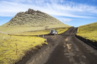 Single crater of the Laki crater row, 4x4 car on road F206, Iceland, Europe