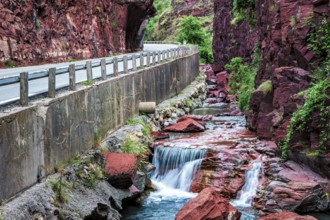 Road through canyon Gorges du Cians with its red rocks, Département Alpes Maritimes, French