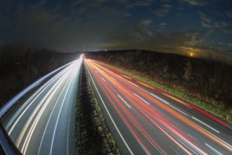 A7 Motorway, Autobahn, beside Kassel at night with light trails from the traffic headlights and
