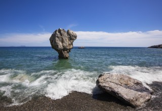 Rock formation on the sandy beach of Preveli Beach, south coast, Crete, Greece, Europe