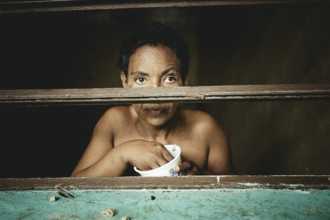 Patient in a psychiatric clinic, Lidice neighbourhood, Caracas, Venezuela, South America