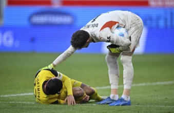 Goalkeeper Kevin Mueller 1. FC Heidenheim 1846 FCH (01) takes care of Omar Haktap Traore 1. FC