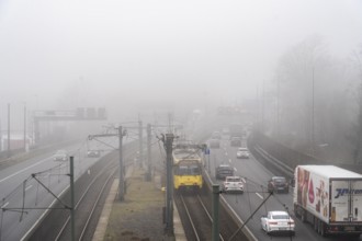 Dense fog, with visibility sometimes less than 100 metres, A40 motorway, city passage in Essen,