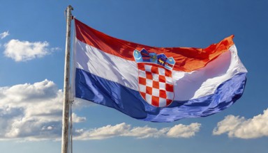 Flags, the national flag of Croatia flutters in the wind