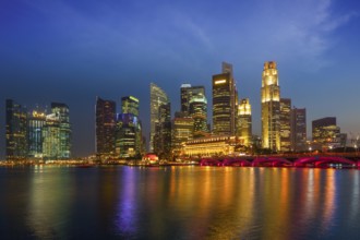 Singapore skyline and Marina Bay in evening