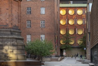 Inner courtyard with brick buildings and contemporary architecture, Carlsberg district, Copenhagen,