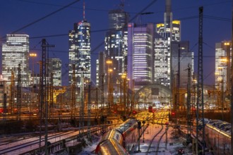 Railway tracks in front of the main railway station in Frankfurt am Main, skyline of skyscrapers in
