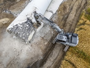 Demolished tower of a 20 year old wind turbine, in the Werl wind farm, 5 old Enercon E-66 turbines