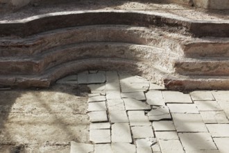 Bathing pool with remains of the limestone cladding, Roman bath ruins Badenweiler, spa town