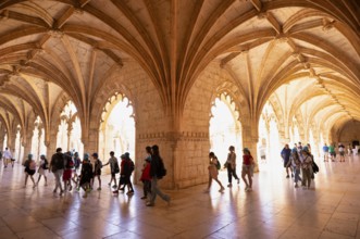 Visitor, Cloister, Hieronymite monastery Mosteiro dos Jerónimos, also Mosteiro de Belém, Belém,