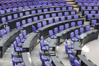 Empty plenary chamber in the German Bundestag, equipped with office swivel chairs in the special