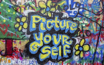 Graffiti on a wall in the Old Town, Prague, Czech Republic, Europe