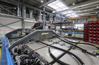 Herten, North Rhine-Westphalia, Germany, Cummins Hydrogenics fuel cell factory. An employee