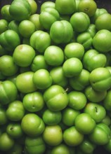 Tkemali, green cherry plum, top view, close-up, food background, no people, selective focus