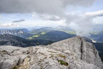Mountaineer on a rocky ridge, Watzmann crossing to the Watzmann Mittelspitze, view of mountain