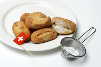 Schenkeli on a plate, sweet pastry for carnival time, Switzerland, Europe