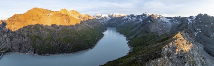 Alpine panorama with Pigne d'Arolla, Lac de Dix, sunset in the mountains, reservoir, Valais Alps,