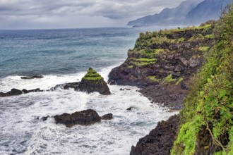 Cliffs, rocky beach and Atlantic Ocean in rainy weather, Seixal, Madeira, Portugal, Europe