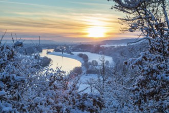 Sunrise at the Scharfenberg viewpoint on a winter morning, view of the Elbe valley as far as