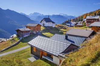 View of the village with Maria zum Schnee chapel in autumn, Bettmeralp, Goms, Rhone Valley, Upper