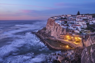 Scenic view of the seaside Azenhas do Mar fishing village on cliff on Atlantic ocean coast,