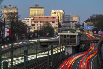 Motorway A40, Ruhr expressway, heavy traffic jam, rush hour, city passage in Essen, skyline of the